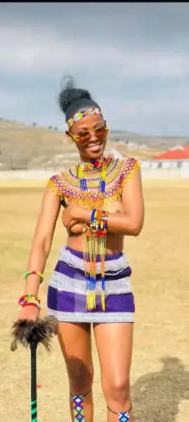 AI Video: Zulu girl dancing in park wearing traditional clothes