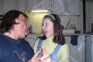 AI Video: both persons start kissing each other in the mouth with passion