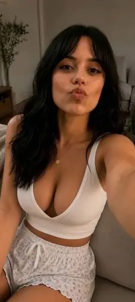 AI Video: Jenna ortega is looking fantastic in her apartment. She leans slightly...